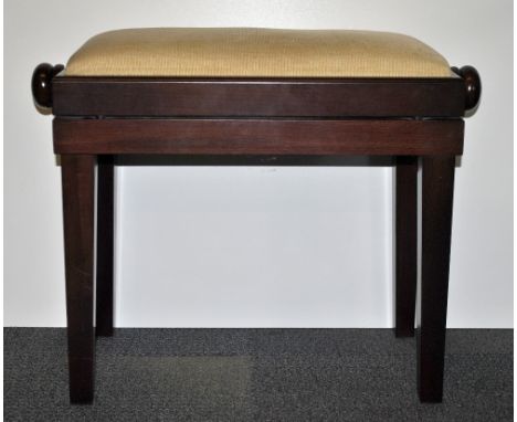 A contemporary adjustable piano stool.