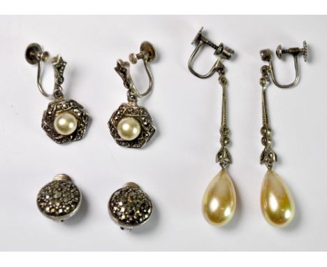 Three pairs of vintage silver earrings.