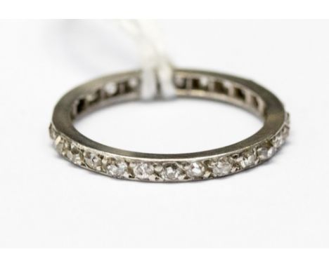 A diamond eternity ring, fully set with brilliant cut diamonds, finger size L, with a total gross weight of approx 1.5gms