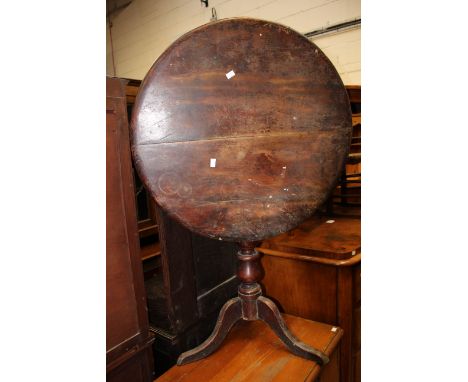 A George III mahogany tilt top tripod table