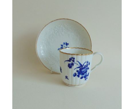A Worcester dry blue gilt coffee cup and saucer, circa 1780, cup marked with dry blue flower, cup, 6 cm diameter approx, 6 cm