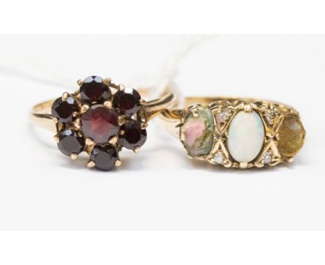 A 9ct gold ring set with garnet cluster with a 9ct ring set with damaged opals and diamond chips, total weight approx 5.7 gra