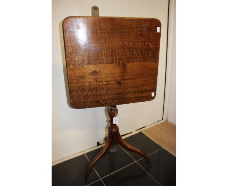 A George III oak occasional table, square top, tripod base 