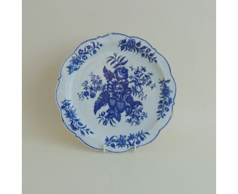 A Worcester blue and white plate, Pinecone pattern, circa 1770, 21.5 cm diameter approx Provenance - The Late Noel Howard Col