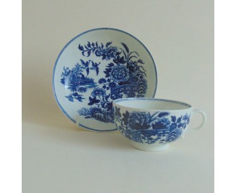 A Worcester tea cup and saucer, Fence pattern, circa 1775, bowl, 7.5 cm diameter approx, 3.5 cm high approx, saucer, 12 cm ap