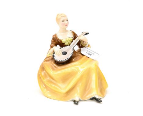 A Royal Doulton seated figure 'Symphony' HN 2287 with PAS initials to base and impressed no figure is playing a Mandolin 