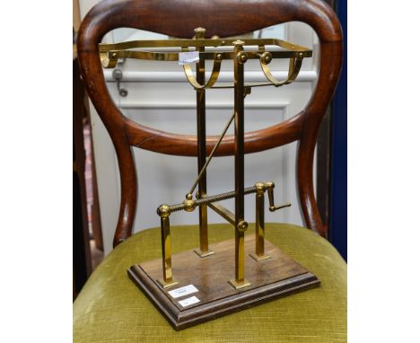 Lacquered brass decanter holder