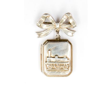 A Victorian silver locket fob, on a bow catch with embossed scene of an early steam engine 