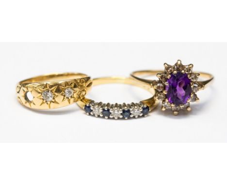 An 18ct gold dress ring, an 18ct gold ring diamond set (one stone missing) and a sapphire and diamond 18ct ring, sizes O,K an