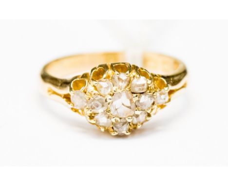 An 18ct gold and diamond cluster ring, set with rose cut diamonds, Birmingham 1878, size O with a total gross weight approx 5