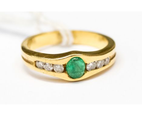 An emerald, diamond and 18ct gold dress ring, the central oval cabochon cut emerald with three small diamonds either side, gr