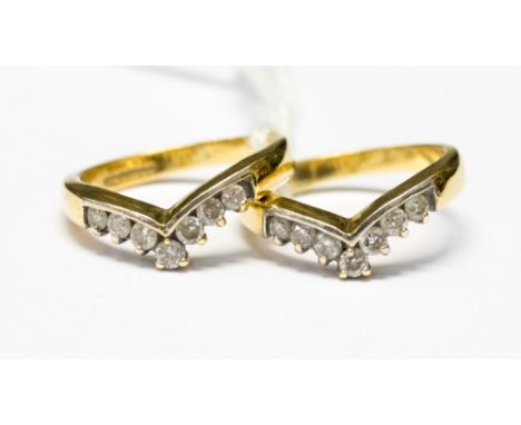 Two eighteen carat gold and diamond wish bone rings, approx ring size I and I½, approx combined total gross weight 7g