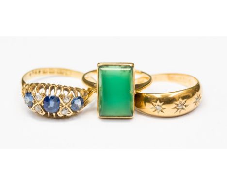 An early 20th century, 18ct gold ring set with a large emerald green stone, ring size J, together with a sapphire and diamond