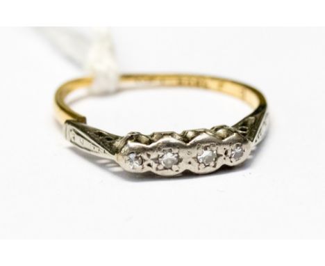 An 18ct gold and platinum ring set with four small diamonds a/f