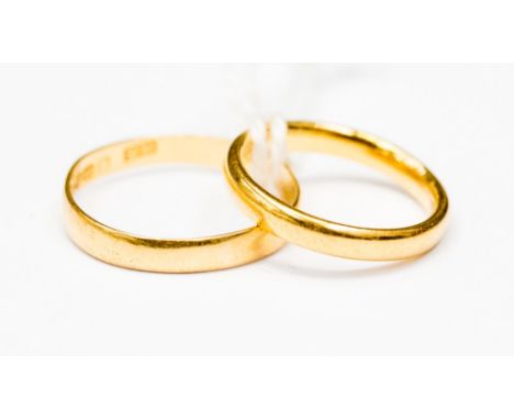 A 22ct wedding band, approx 2.8 mm width, ring size J; together with a 22ct wedding band, 2.8 mm width approx, ring size P, g