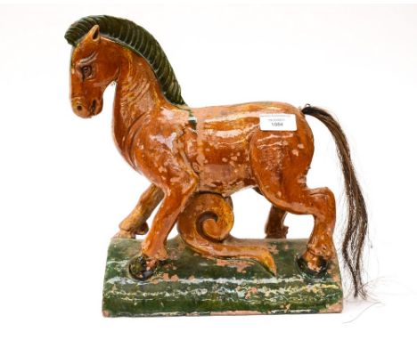 A Chinese teracotta glazed horse ridge roof tile, Ming style 