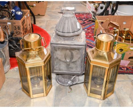 Two brass carriage oil lamps; together with carriage lamp converted to electricity (3) 