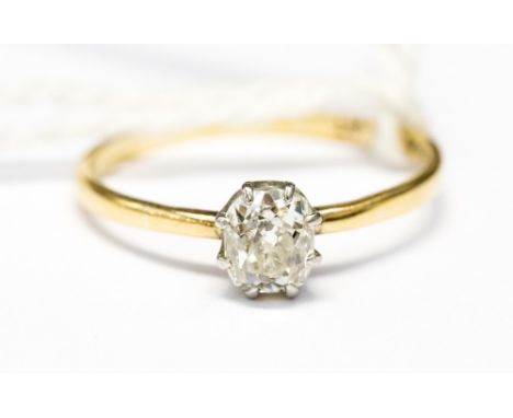 An 18ct gold and platinum diamond solitaire ring, claw set with an old cut diamond approx 0.50ct, size O, with a total gross 