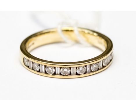 A diamond and 9ct gold half eternity ring, alternate round brilliant and baguette cut small diamonds ring size Q, gross weigh