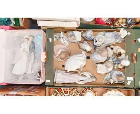 A quantity of Nao Lladro and similar figures, one boxed and a Royal Doulton Siamese cat