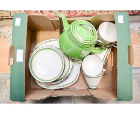 An Art Deco part teaset, including six small plates, five cups, six saucers, sugar bowl, cake plate and a further green Art D