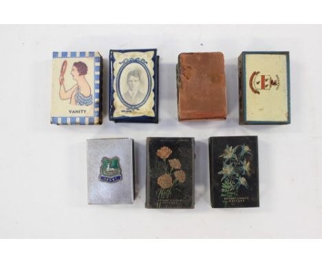 Three enamel on tin matchbox covers; together with novelty example, Derby example, etc (7) 