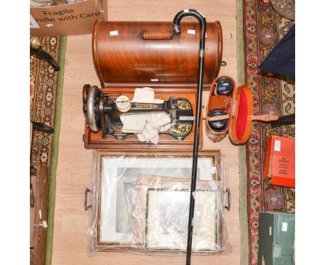 A Singer sewing machine; together with set of binoculars and photographic meter and set of prints and photographs, a tray and