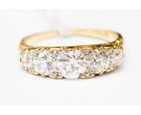 A diamond five stone boat head 18ct yellow gold ring, five round old cut diamonds, approximate total diamond weight of 2.50 c