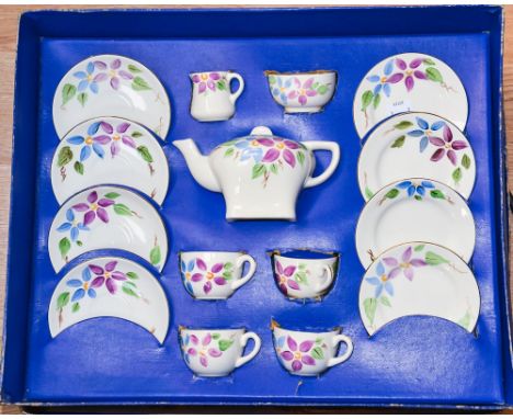 A Royal Cauldron 'Daisies' Corona ware children's tea set, 1952, in original box, hand painted with flowers, including teapot