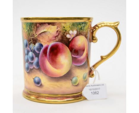 A large Royal Worcester tankard, fruit painting by T. Nutt, gilding to rim, base and handle 