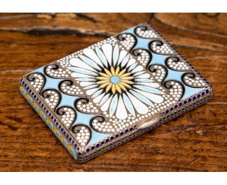 A Russian silver and enamel cigarette case, the champleve enamel with black scrollwork on a turquoise ground, and central flo