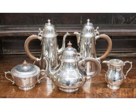 Tiffany & Co, a five piece silver tea and coffee service of 18th Century design, comprising pair of tapered coffee pots, tea 