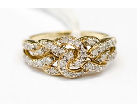 A nine carat gold ladies diamond dress ring, approx ring size 'R' and approx weight 4g