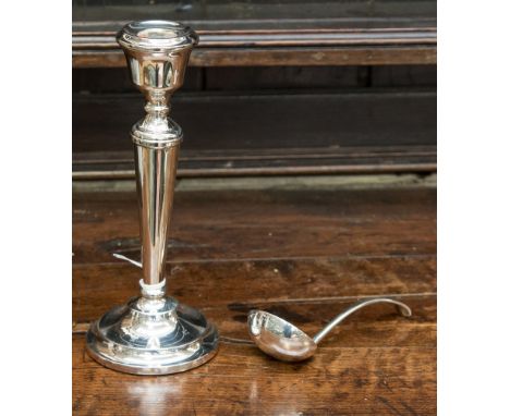 Silver candlestick, Birmingham 1972/3, together with small silver ladle, Sheffield 1931 (2)