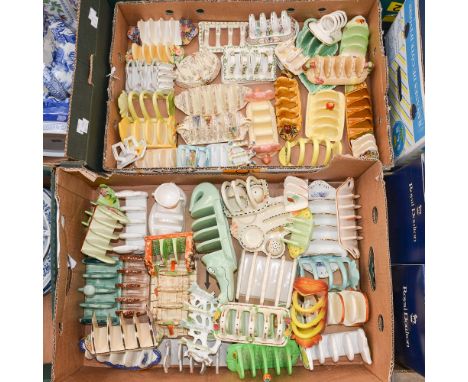 A large collection of assorted ceramic toast racks, mostly hand painted, including Crown Devon, Carlton ware, etc (two boxes)