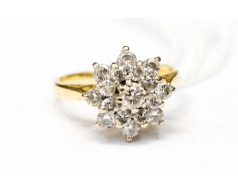 An eighteen carat gold and diamond flower cluster ring, approx size H, approx total gross weight 3.5g