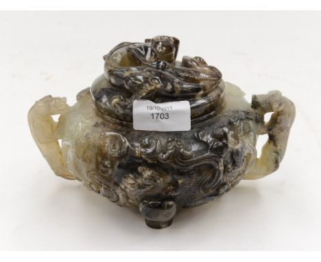 A carved jade sensor and cover