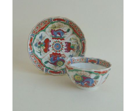 A Worcester Polychrome tea bowl and saucer, Dragons in Compartments pattern, circa 1790, bowl, 8.5 cm diameter approx, 4 cm h