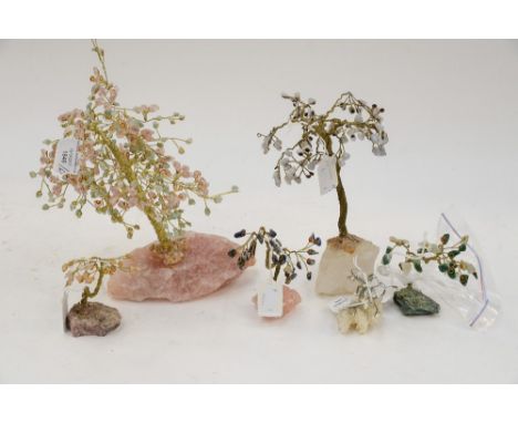 A collection of gemstone trees mounted on quartz and coral mounts (6) 
