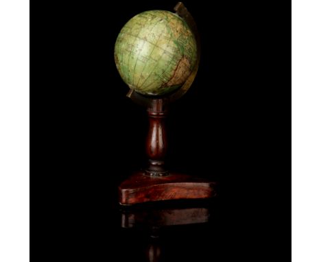 A Small English Globe, by JL & Co. London, on stand, lacquered brass meridian half circle, on wooden baluster turned column w