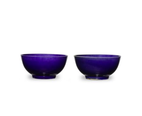 A FINE AND RARE PAIR OF AUBERGINE-GLAZED BOWLSKangxi six-character marks and of the periodEach entirely covered inside and ou