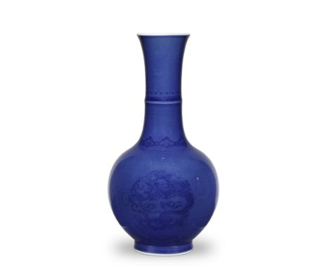 AN UNUSUAL BLUE-GLAZED BOTTLE VASEJiajing six-character mark, KangxiThe oviform body delicately painted on both sides with a 