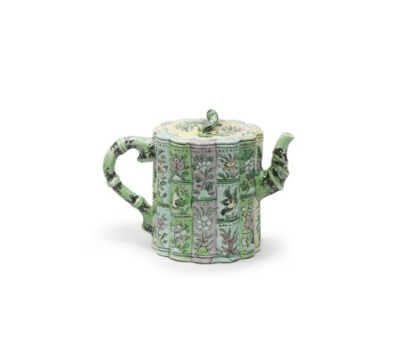 A FAMILLE VERTE BAMBOO-MOULDED TEAPOT AND COVERKangxiThe cylindrical body vertically moulded in twelve lobes resembling bambo