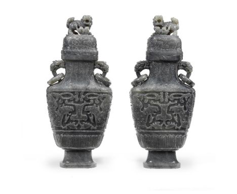 A PAIR OF LARGE GREY JADE TWO-HANDLED BALUSTER VASES AND COVERSQianlong four-character marks, 20th century Each flattened bal