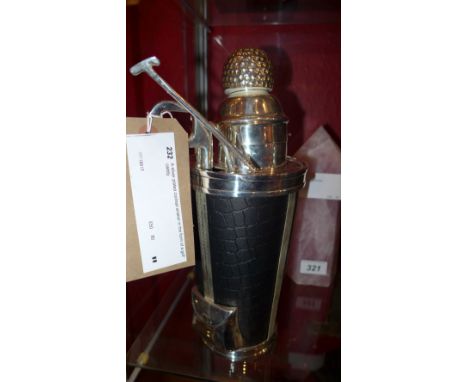 A silver plated cocktail shaker in the form of a golf caddy