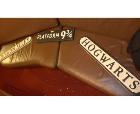Three Harry Potter style wooden signs
