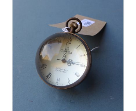 An Omega style bullseye clock in working order