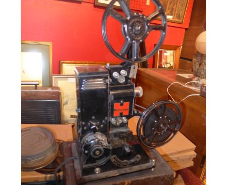 various cine projectors. 2 x16mm Bell and Howell and Elf projectors and Pathescope (working) projector. 16mm footage of 1937 