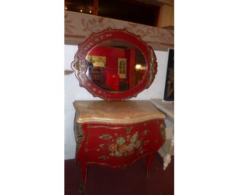 A Continental painted bombe commode chest with floral painted detail and fitted two drawers, with ormolu figural mounts and m