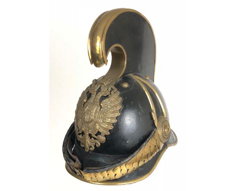 Austro-Hungarian 1905 Model Dragoon Trooper's Helmet.  Good scarce  example of black leather mounted to the front with an Imp